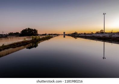 New Orleans, USA - Nov 28, 2017: View At Dusk Of The 17th Street Canal Around The West End Area. This Canal Forms Part Of The City's Flood Control Mechanism.