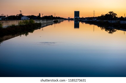 New Orleans, USA - Nov 28, 2017: View At Dusk Of The 17th Street Canal Around The West End Area. This Canal Forms Part Of The City's Flood Control Mechanism.