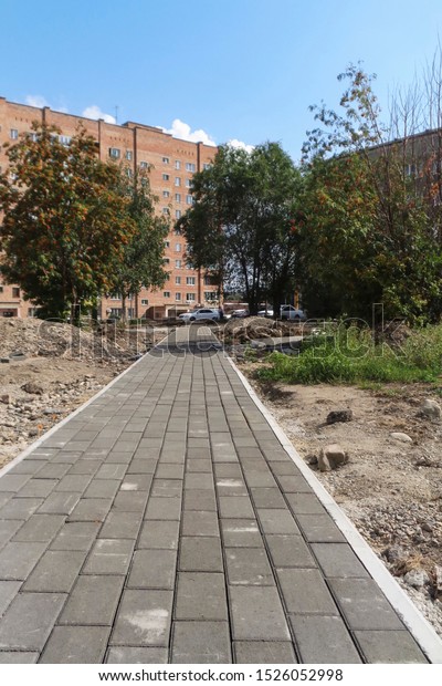 New pedestrian\
walkway. New building area.\
