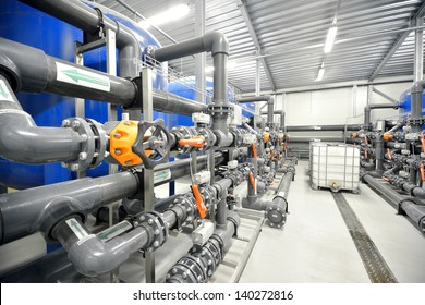 new plastic pipes and colorful equipment in industrial boiler room