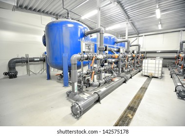 new plastic pipes and colorful equipment in industrial boiler room