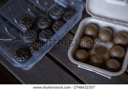 New Portion compressed coffee tablets, Used pods for coffee machine placed in biodegradable carton container, round coffee pucks made from pressed ground organic ready for espresso brewing