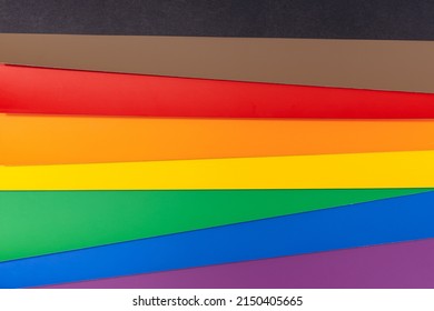 New Pride Flag Background With Black And Brown Stripes. Group Of Colored Cardboard