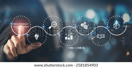 New product development and project roadmap concept. Business professional touching digital virtual screen with new product development roadmap icons, ideation, development and launching process. 