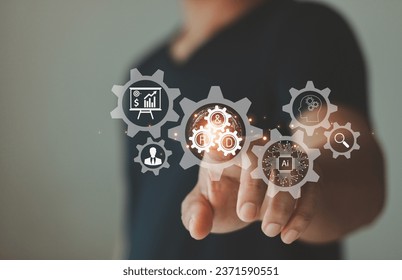 New product development or software development concept. Using AI in the design process. Businessman pointing to R and D cog research and development and gear icons as a continuous process automation.