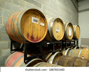 New Providence, NJ - USA - 01-25-2020: Beer Aging In Array Of Wooden Barrels In Small Craft Brewery