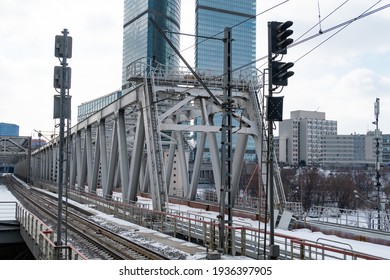 New railway bridge across the Moskva river against the background of modern buildings, Moscow, 2021
