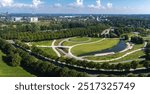 New redesigned Victory park in Riga, Latvia with a pond and pedestrian walks. Aerial view of the park near Riga center.