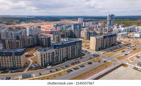 New Residential Area On The Outskirts Of The City. New Affordable Housing. Mortgage Background Concept Image. Aerial View Of New Multi-storey Residential Building Apartment Houses.