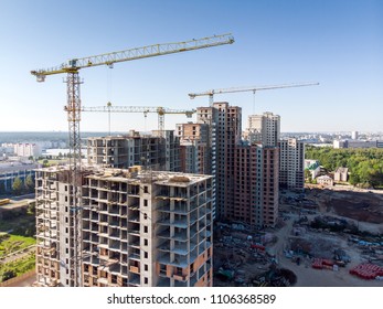 New Residential Building Under Construction Against Blue Sky. Aerial View