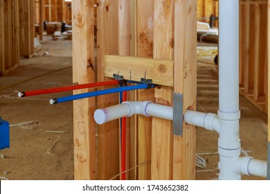 New Residential Construction House Framing A Plumbing In The Laundry Room On Beam Framing