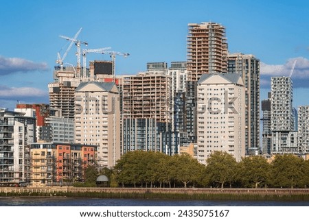 New residential development next to river Thames in Isle of Dogs, London, England