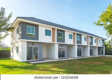 New Residential Town Home Housing Estate Modern buildings with tree.