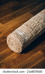 New Rolled Jute Rug With Chunky Texture On Oak Flooring, Natural Fiber Carpet, Eco Friendly Home Interior Concept, Shallow DoF