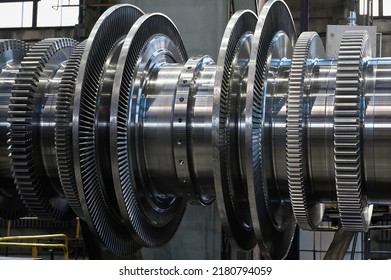 New rotor of powerful steam turbine in plant workshop - Shutterstock ID 2180794059
