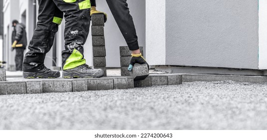 new sidewalk made of concrete interlocking paving blocks - Powered by Shutterstock