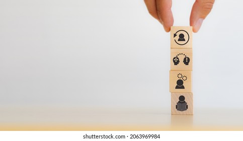 New skill development for business adaptation of technology and digital transformation. Changing skill demand. Hand hold wood cubes re-skill icon with self learning, coaching, knowledge sharing icon.