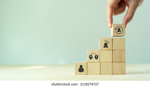 New Skill Development For Business Adaptation Of Technology And Digital Transformation. Changing Skill Demand. Hand Hold Wood Cubes Reskill Icon With Self Learning, Coaching, Knowledge Sharing Icon.