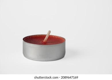 New small wax candle on white background