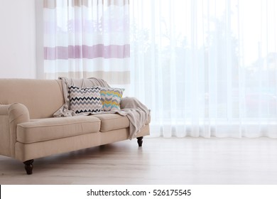 New Sofa On Curtain Background