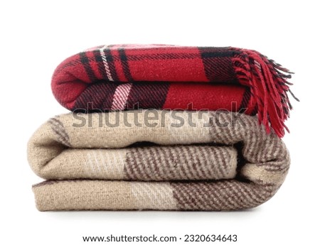 New soft folded blankets on white background