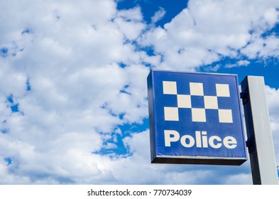 New South Wales Police Station Sign With Cloudy Sky At The Background.