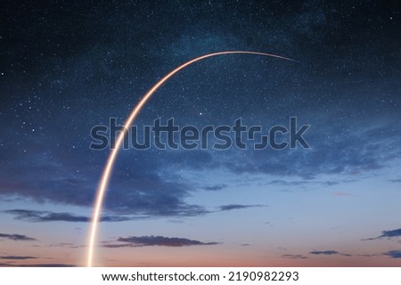 New space shuttle with a light trail flies into the amazing starry sky. Beginning a space mission and exploring the cosmos. Successful rocket launch. Rocket launch to the space with bright light.