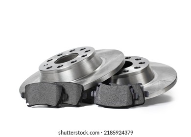 New spare parts for brake repair. Brake discs and brake pads on a white background. - Shutterstock ID 2185924379