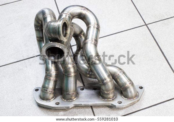 a new sports\
exhaust manifold of the\
engine