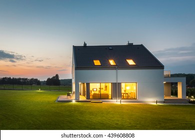 New style villa with outdoor lighting, night view