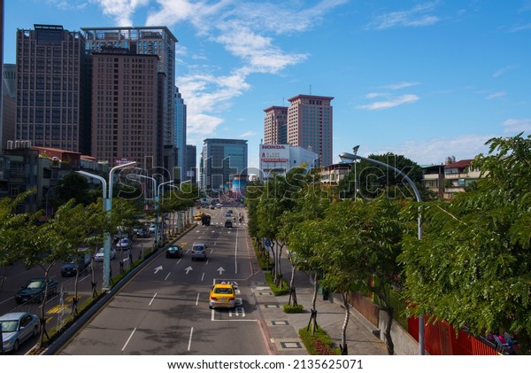 New Taipei City, Taiwan -\
December 8, 2013 : Street view of the city with buildings and\
skyscrapers