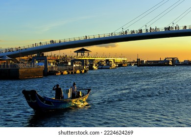 New Taipei City, Taiwan - July 16, 2009: View Of A Moving Fishing Boat Returning To The Port At Dusk Sunset