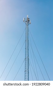 New Telecommunication Antenna On Background Of Blue Sky. Satellite Dish Telecom Network At Communication Technology Network. Telecom Broadcasting Tower. Modern Cell Tower 5G, 6G