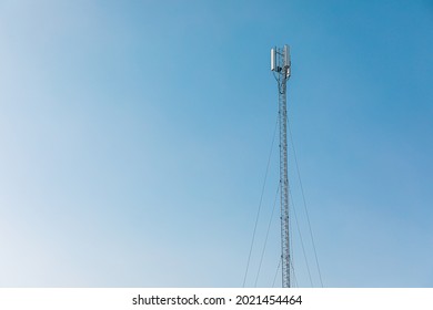 New Telecommunication Antenna On Background Of Blue Sky. Satellite Dish Telecom Network At Communication Technology Network. Telecom Broadcasting Tower. Modern Cell Tower 5G, 6G