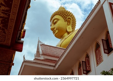 New temple Wat Paknam Bhasicharoen viewed from a pathway leading to the main courtyard - Powered by Shutterstock