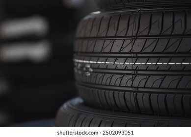 A new tire is placed on the tire storage rack in the tire industrial. Be prepared for vehicles that need to change tires.