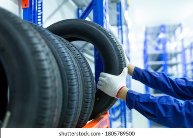 New tires that change tires in the auto repair service center in the stock blur for the industry, a four-wheeled tire set at a warehouse