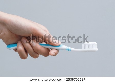 New toothbrush and toothpaste with  cleaning teeth