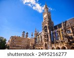 New Town Hall and Frauenkirche at Marienplatz square in Munich, Germany