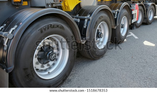 New truck of urban\
municipal rescue services with perspective view to row of\
articulated lorry wheels.Heavy duty emergency vehicles and\
equipment. Moscow,Russia,Sept\
2019