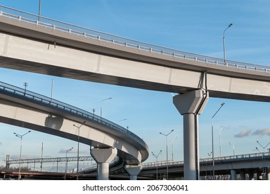 New turning automobile overpasses, bottom view. Modern road infrastructure
