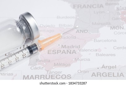 New Vaccine On The Background Spain Map. Vaccine Against Coronavirus. Covid-19 Pandemic, 2019-nCov.