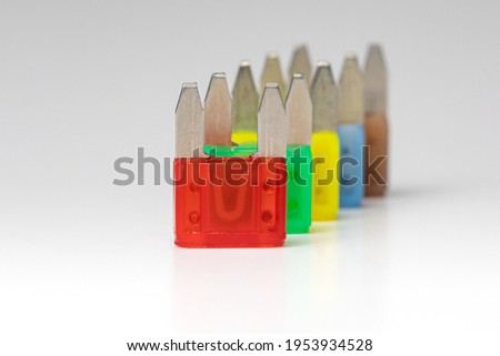 New vehicle mini fuses isolated on white background.  Concept of automobile electrical repair, service and maintenance 商業照片 © 