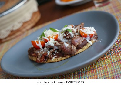 New vision of traditional Mexican cuisine  "huarachito de arrachera"