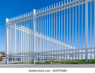 new white double fence made of metal