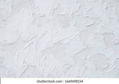 New White Painted Plaster Om Wall Closeup 
