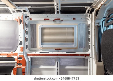 new window. Camper van conversion. installing a side window. Inside of a camper van. 