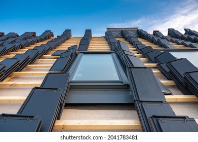 A New Window And New Flat Tiles On A Roof Of A Private House.