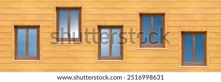 New windows made of colored plastic on the facade of the house