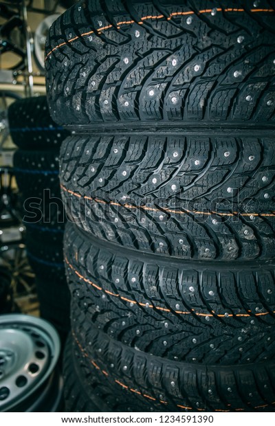 New\
winter tires in shop or store for sale, close\
up
